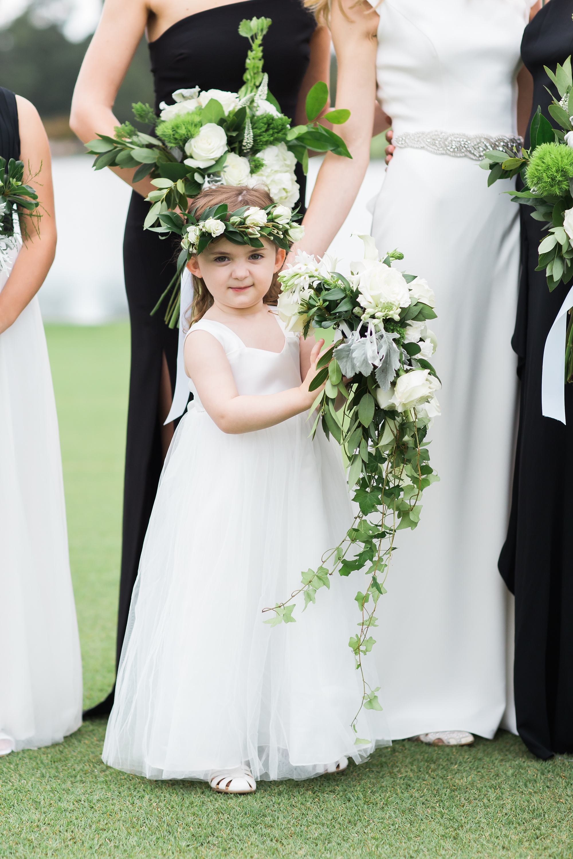 Adorable flower girl in a white flower crown at East Lake Golf Club by Top Atlanta Wedding Photographer Leigh Wolfe Photography