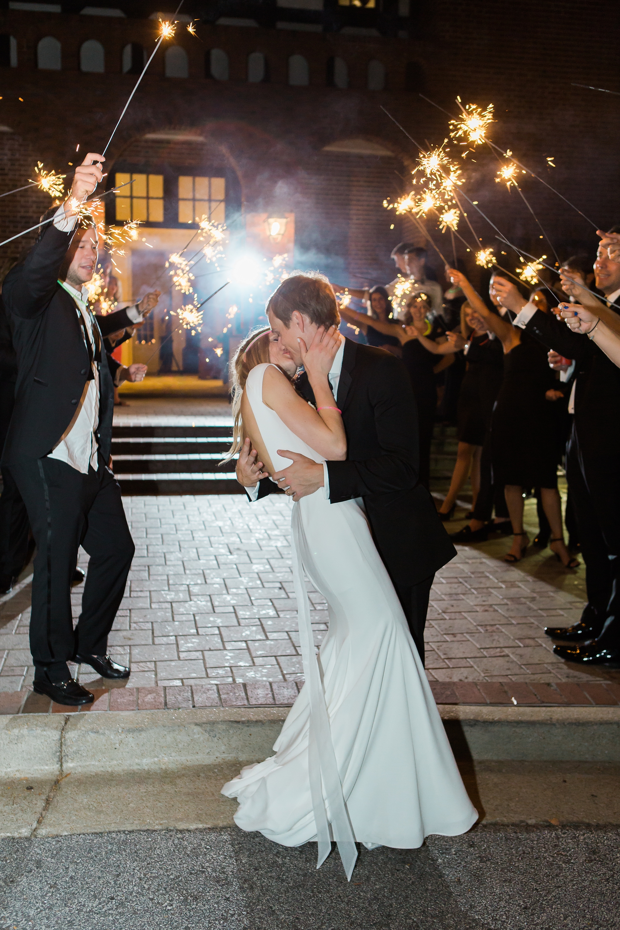 Last kiss of the night. Black Tie Wedding Reception at East Lake Golf Club by Atlanta based wedding photographers Leigh and Becca