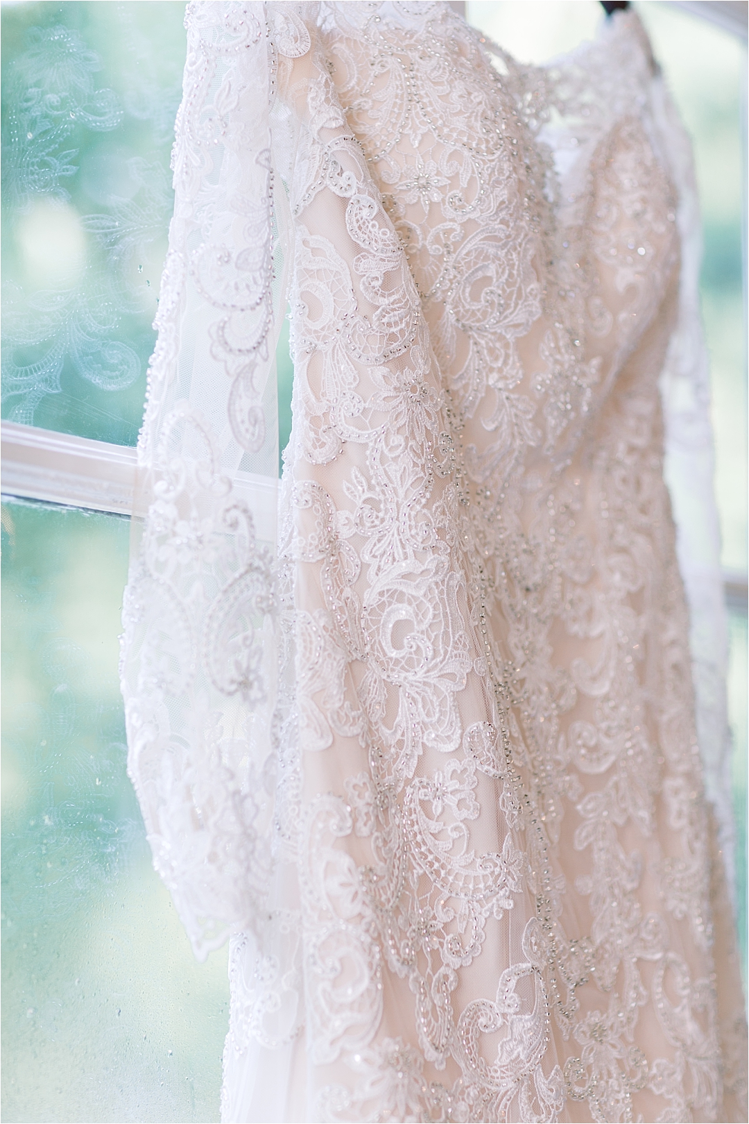 lace wedding dress in window_Photos by Leigh Wolfe, Atlanta's Top Wedding Photographer