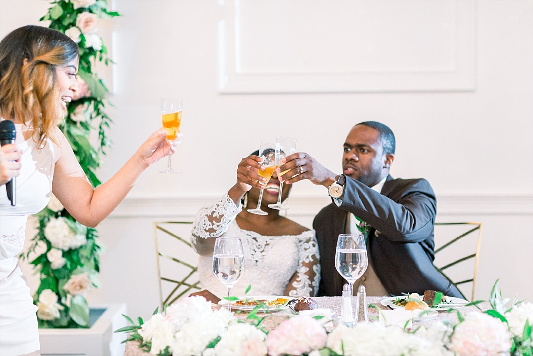 couple toasting with champagne_Photos by Leigh Wolfe, Atlanta's Top Wedding Photographer
