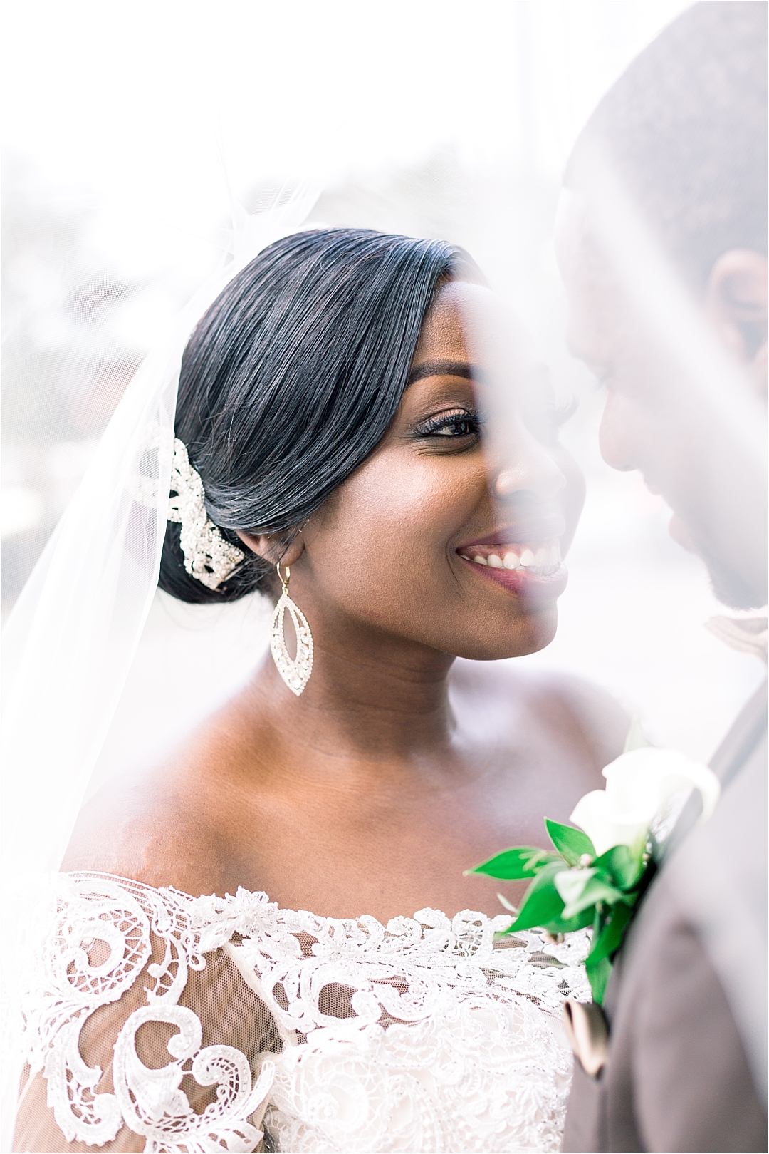 bride and groom behind veil_Photos by Leigh Wolfe, Atlanta's Top Wedding Photographer