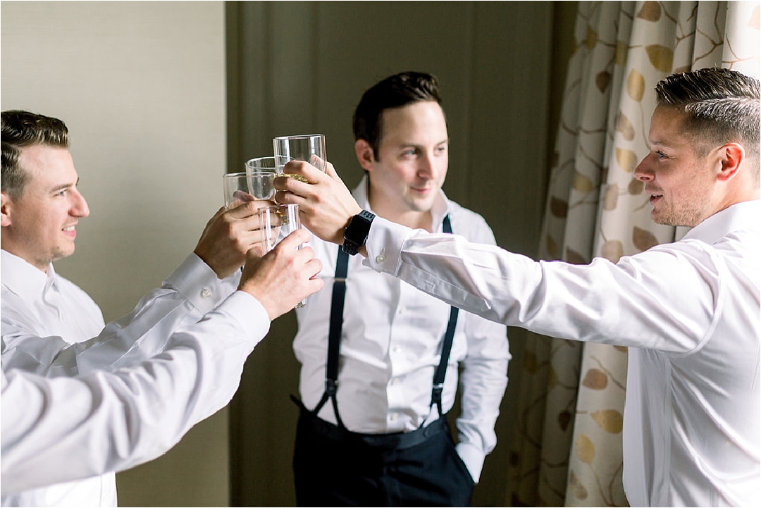 groomsmen cheers_Photos by Leigh Wolfe, Atlanta's top wedding photographer