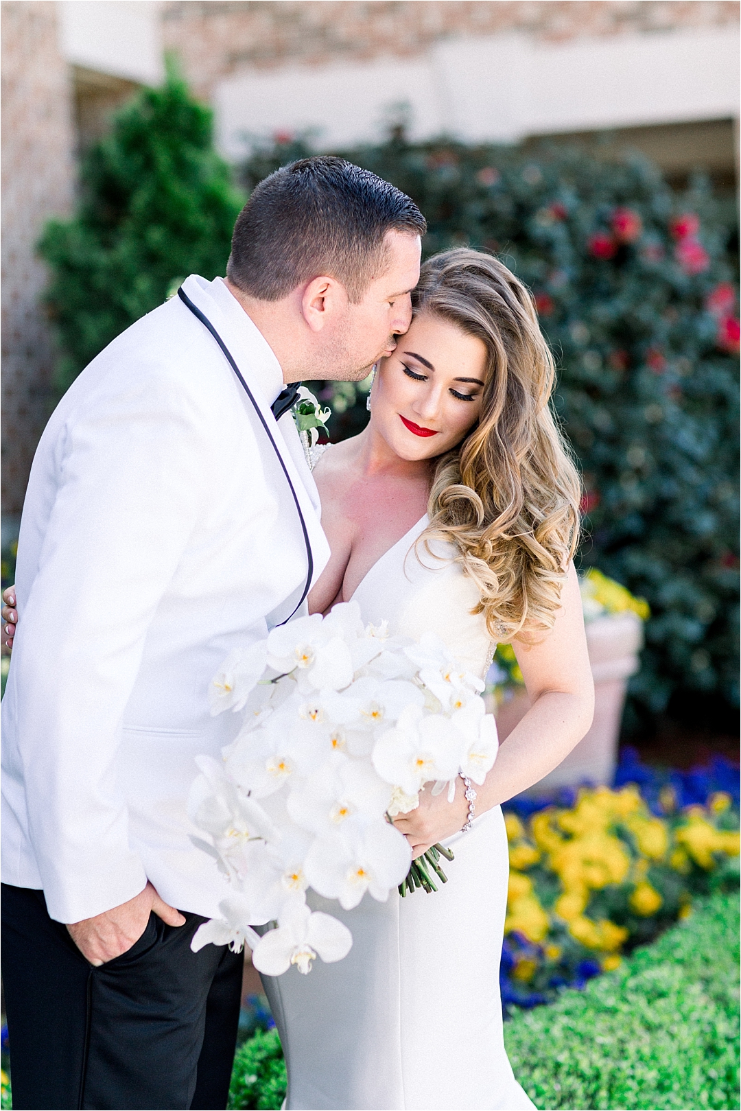 groom kissing bride_Photos by Leigh Wolfe, Atlanta's Top Wedding Photographer