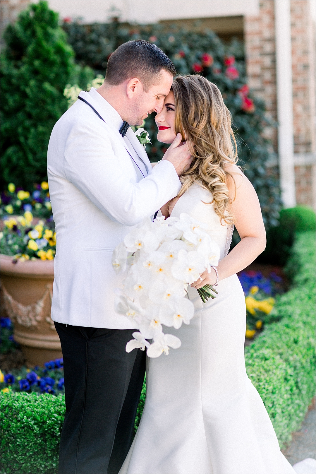 groom kissing bride_Photos by Leigh Wolfe, Atlanta's Top Wedding Photographer