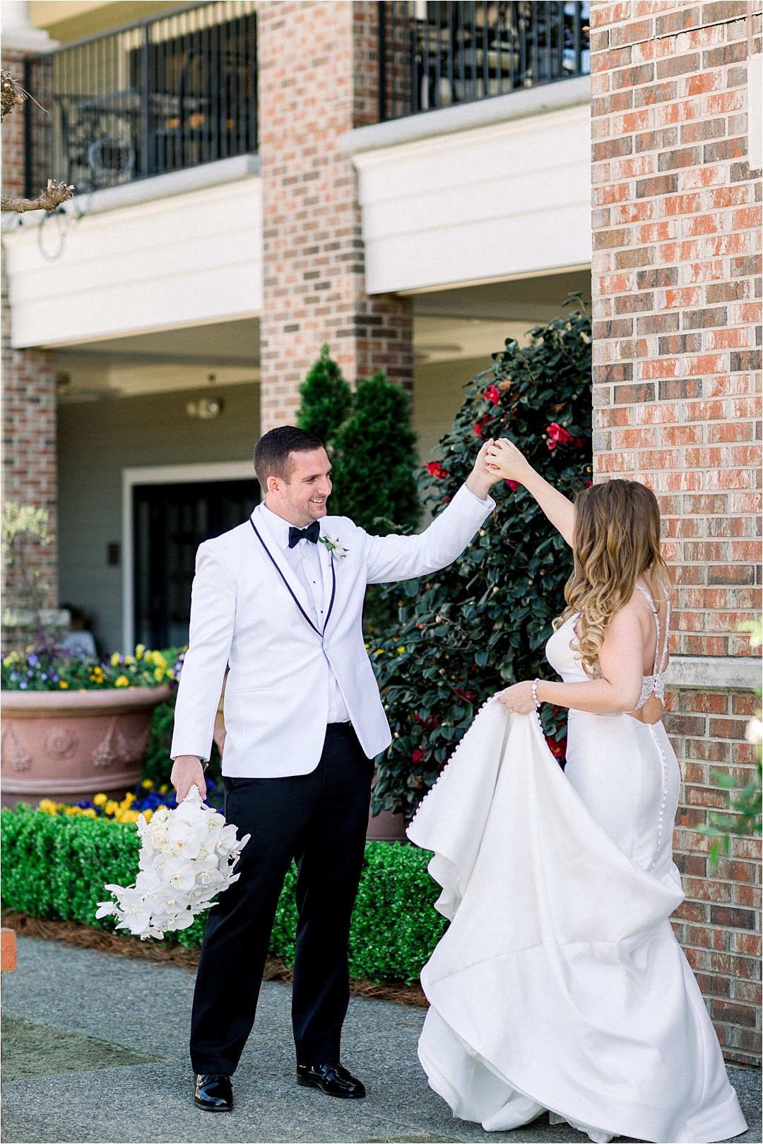 bride twirling in dress_Photos by Leigh Wolfe, Atlanta's Top Wedding Photographer