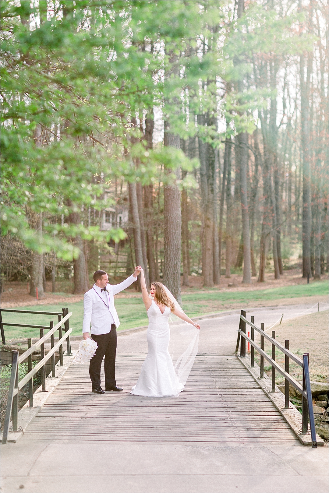 groom spinning bride_Photos by Leigh Wolfe, Atlanta's Top Wedding Photographer