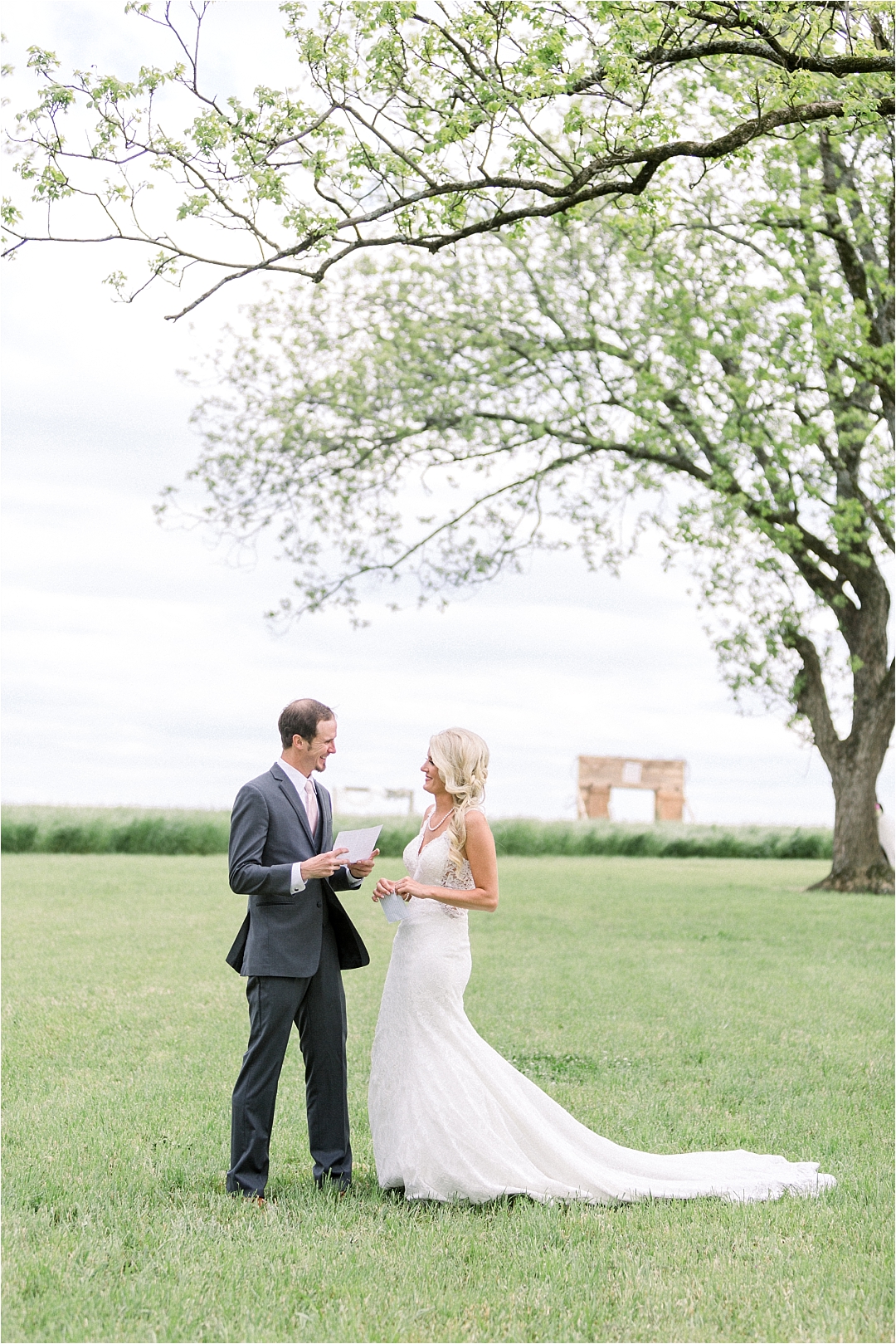 bride and groom beneath big oak tree_Photos by Leigh Wolfe, Atlanta's Top Wedding Photographer