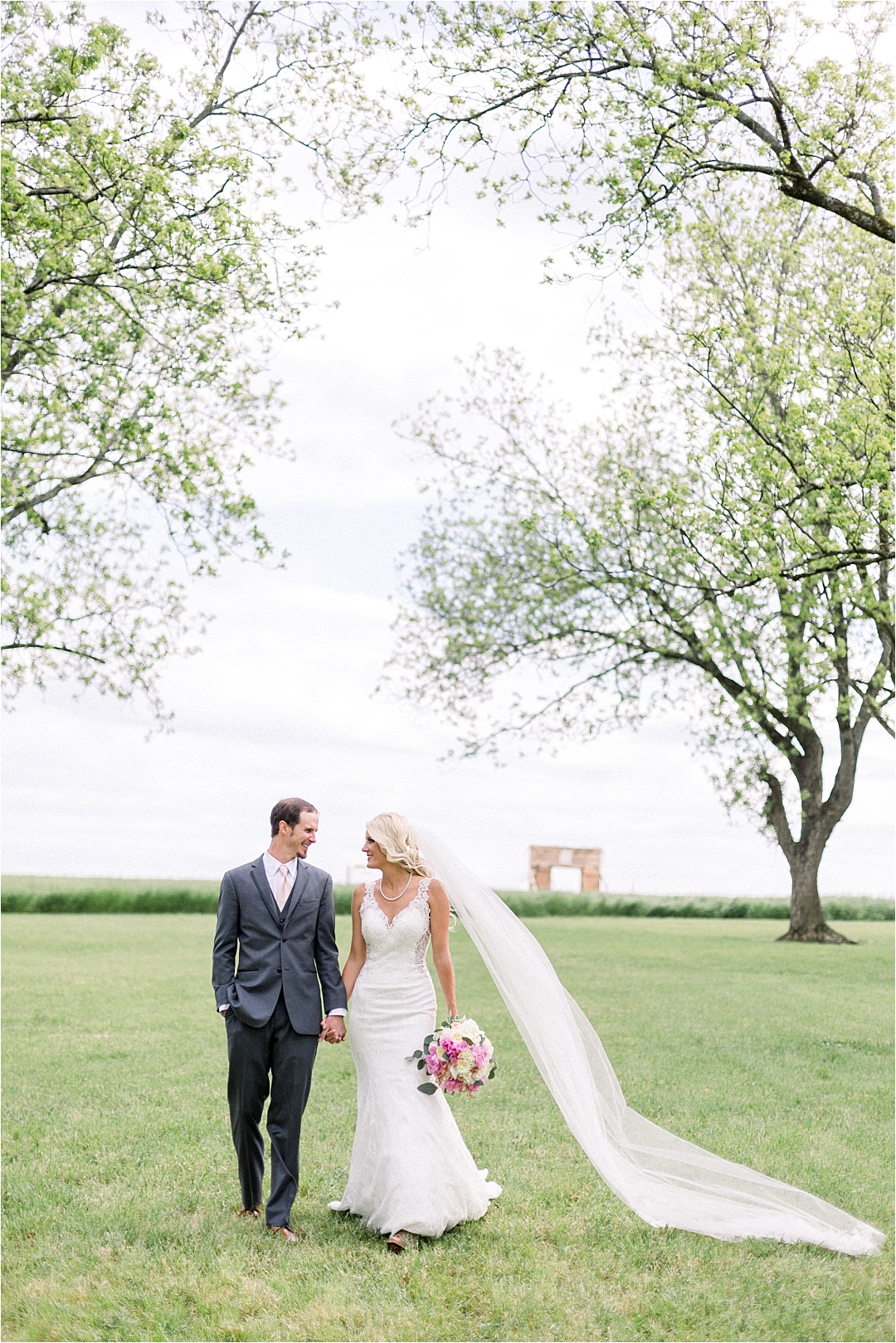 bride and groom at farm wedding_Photos by Leigh Wolfe, Atlanta's Top Wedding Photographer