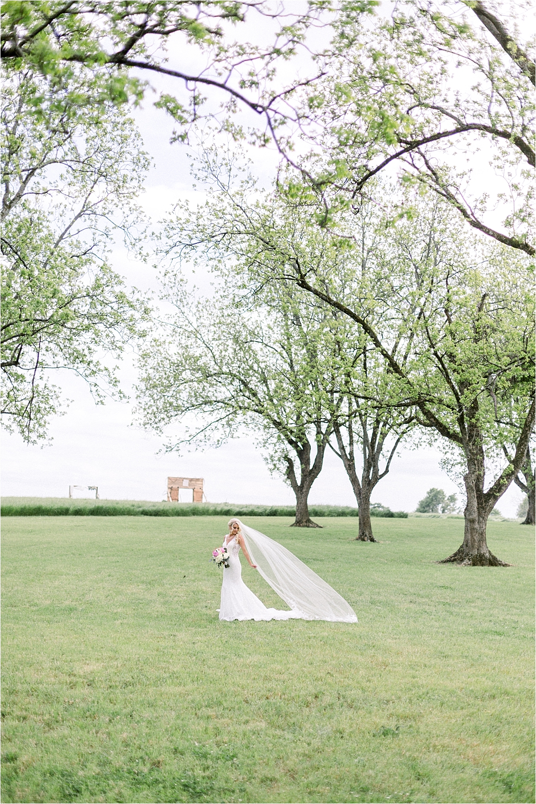 bride with long veil_Photos by Leigh Wolfe, Atlanta's Top Wedding Photographer