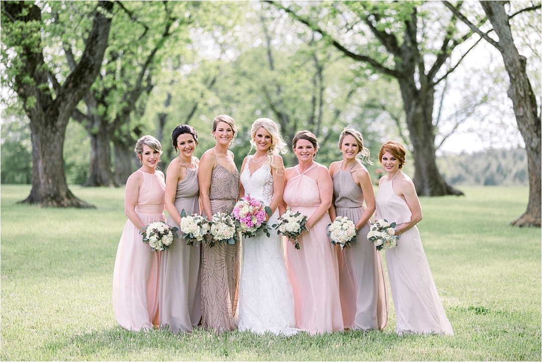 bridesmaids in pastel dresses_Photos by Leigh Wolfe, Atlanta's Top Wedding Photographer
