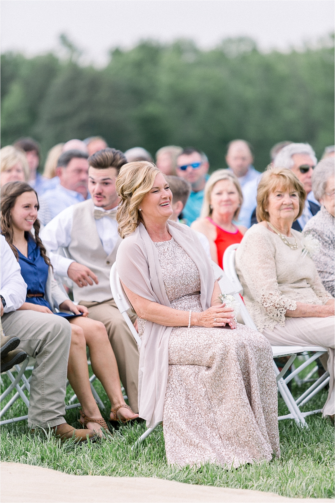 mother of bride watching ceremony_Photos by Leigh Wolfe, Atlanta's Top Wedding Photographer