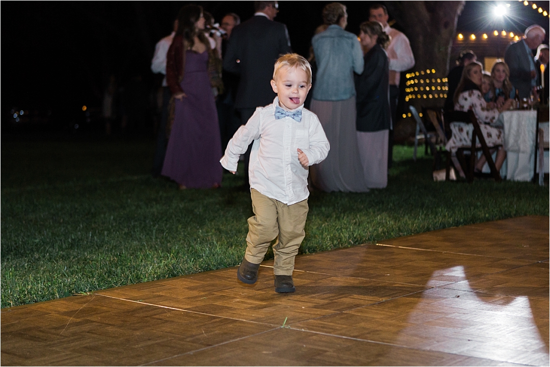 little boy dancing at wedding_Photos by Leigh Wolfe, Atlanta's Top Wedding Photographer