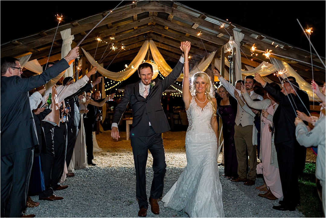 bride and groom exit with sparklers_Photos by Leigh Wolfe, Atlanta's Top Wedding Photographer