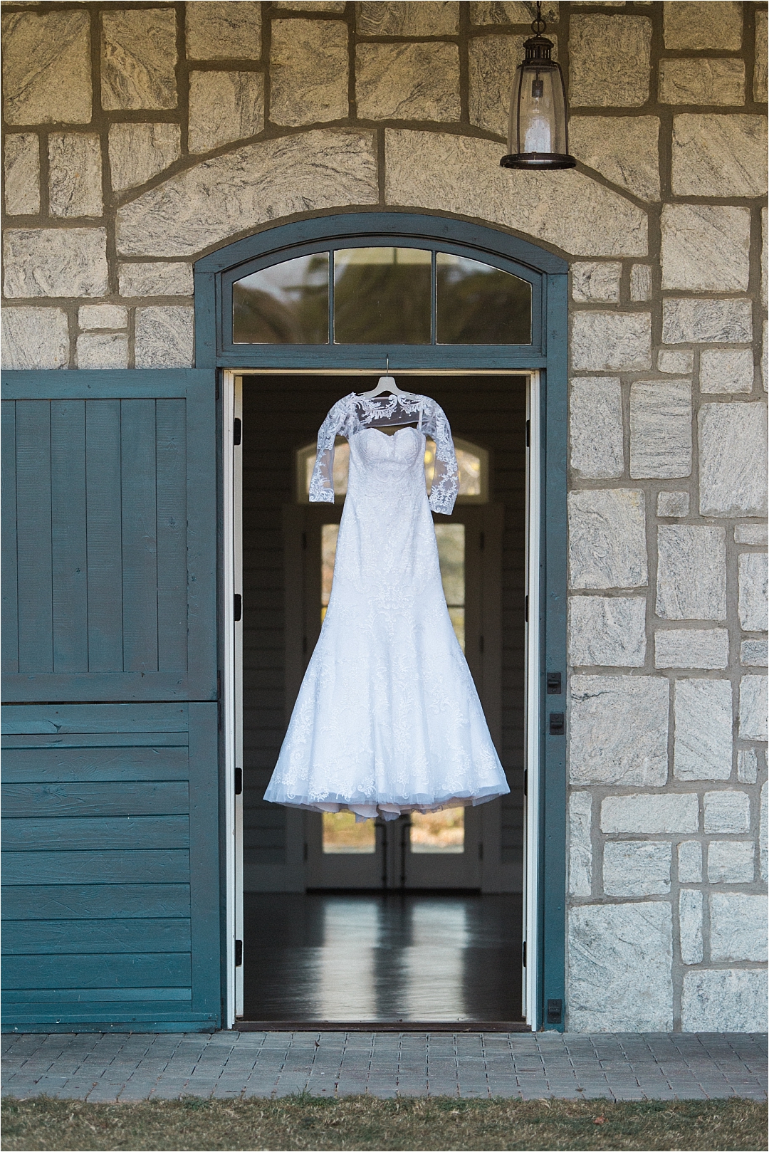 Lace wedding dress in doorway_Photos by Leigh Wolfe, Atlanta's Top Wedding Photographer