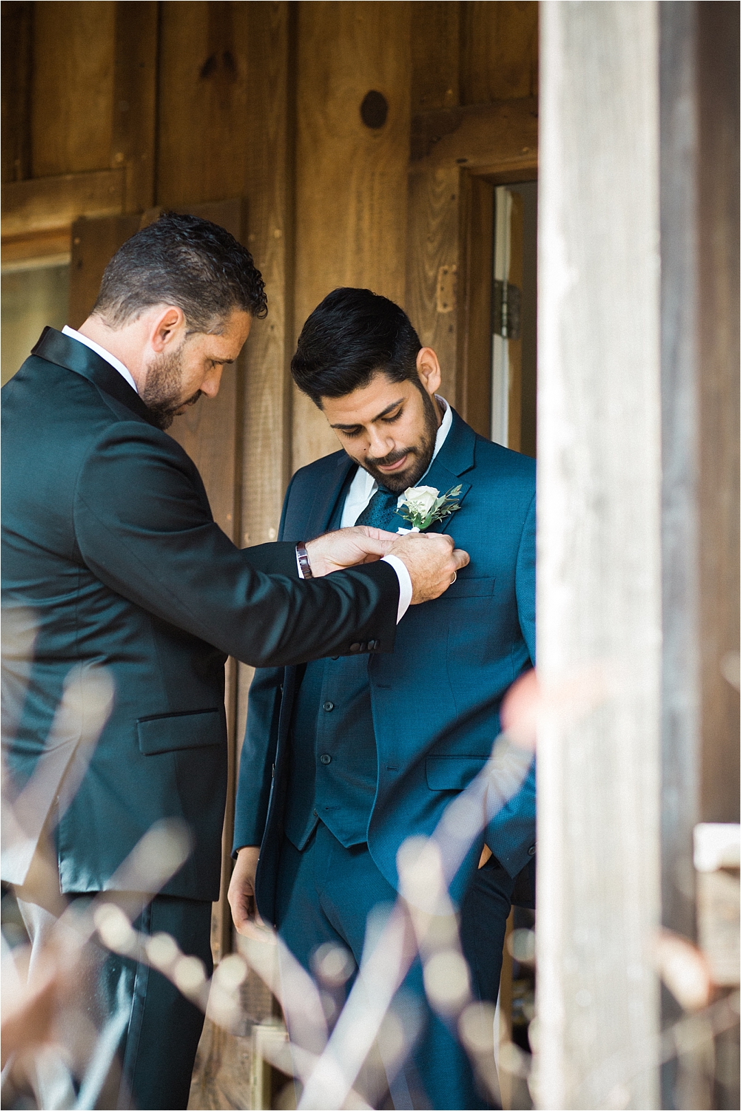 groomsmen helping groom_Photos by Leigh Wolfe, Atlanta's Top Wedding Photographer