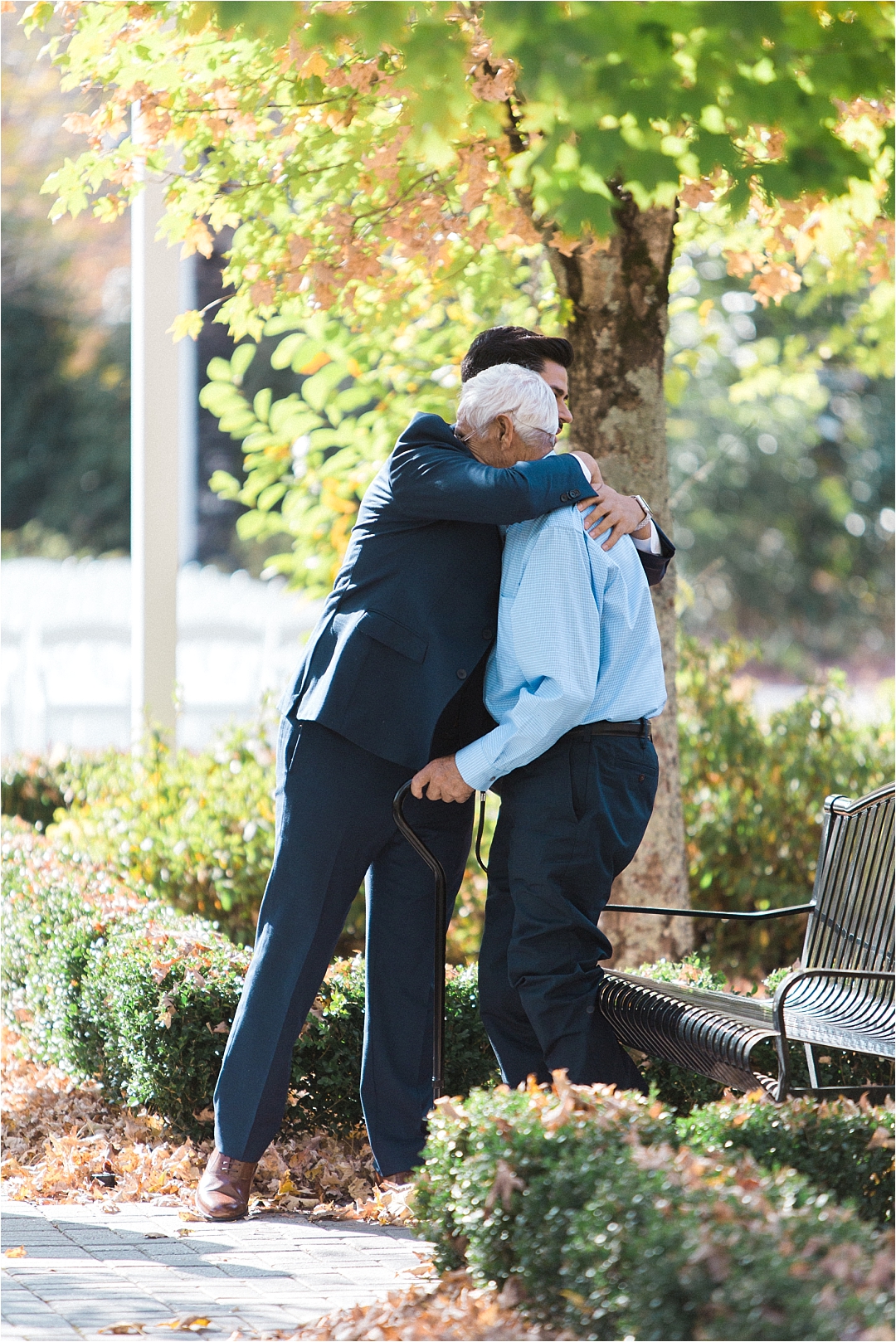 groom hugging grandfather_Photos by Leigh Wolfe, Atlanta's Top Wedding Photographer