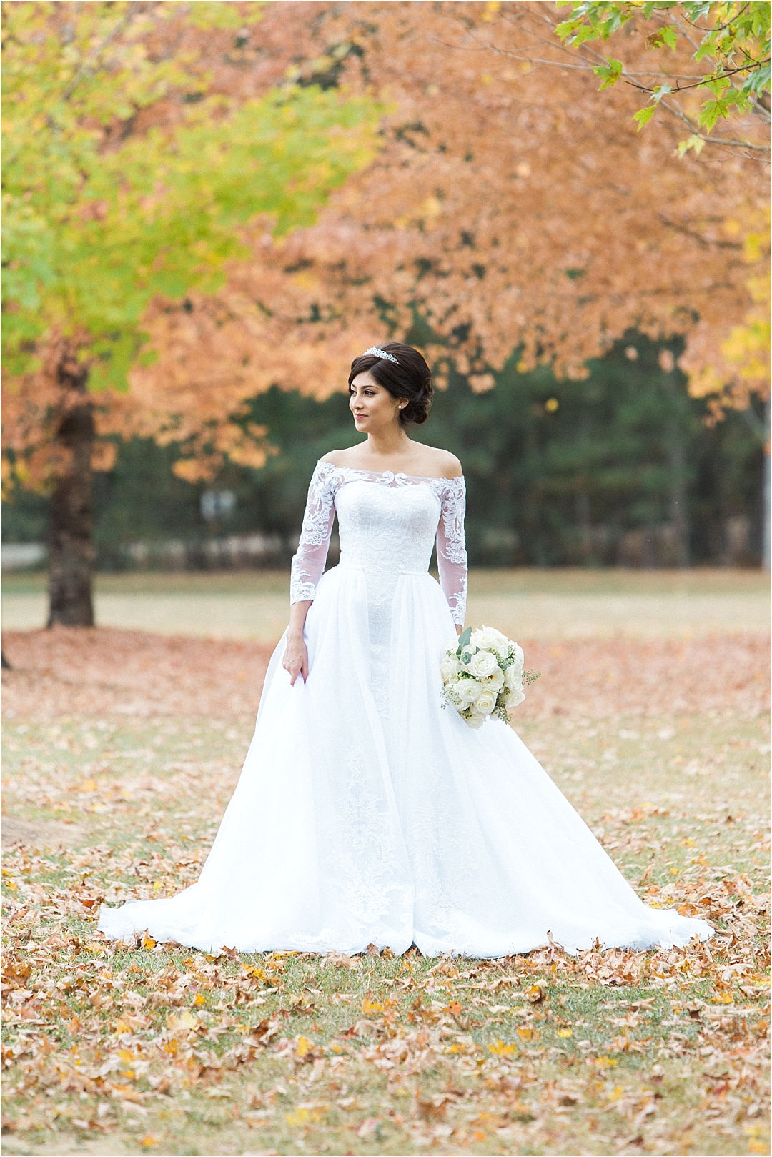 bride in fall leaves_Photos by Leigh Wolfe, Atlanta's Top Wedding Photographer