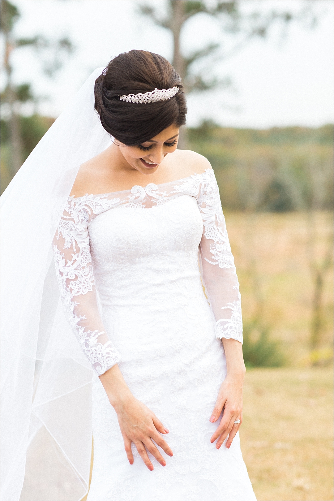 bride in lace wedding gown and veil_Photos by Leigh Wolfe, Atlanta's Top Wedding Photographer