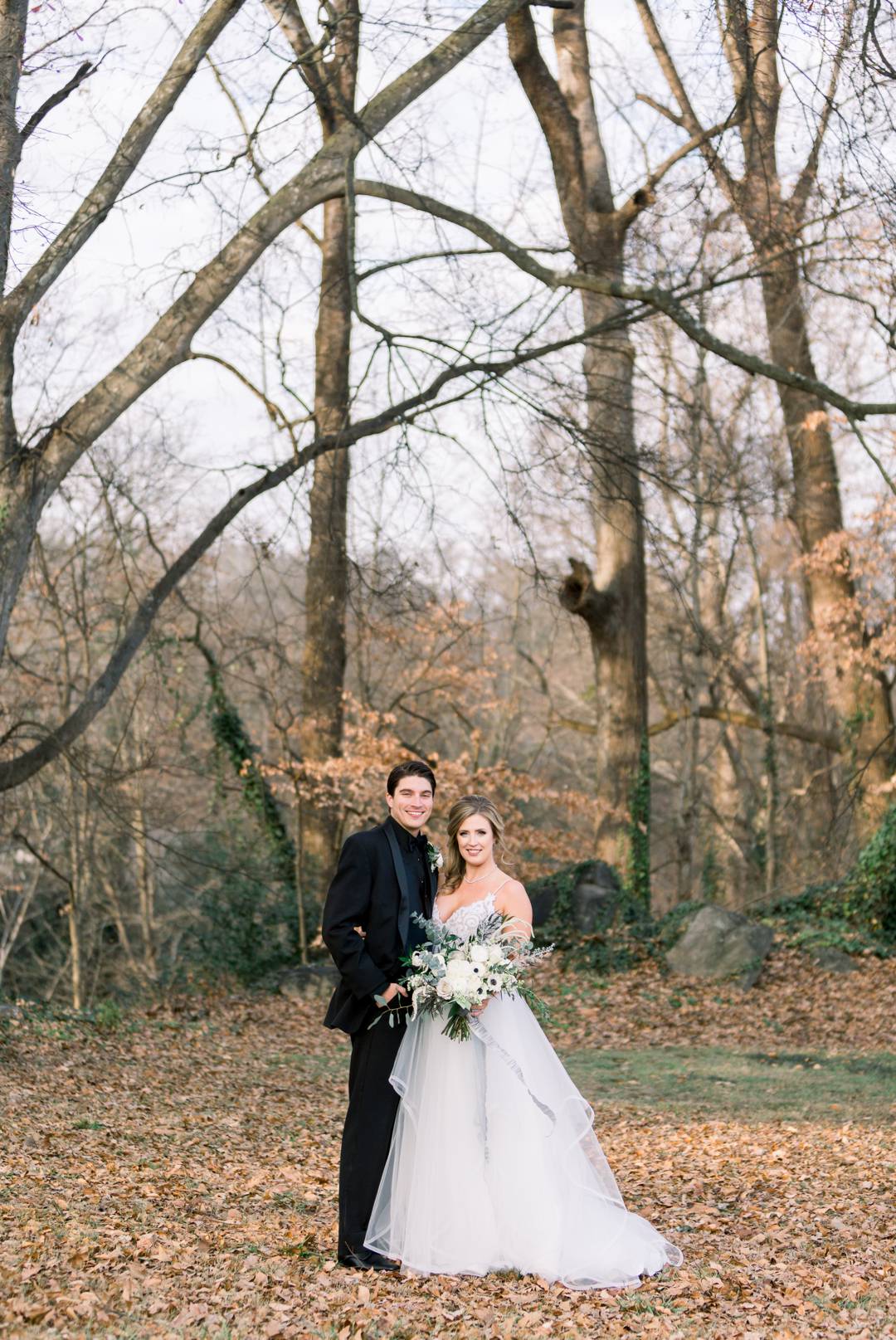 Bride and Groom formals outdoors at American Spirt Works. NYE wedding at the Stave Room by Atlanta wedding photographer Leigh Wolfe Photography.