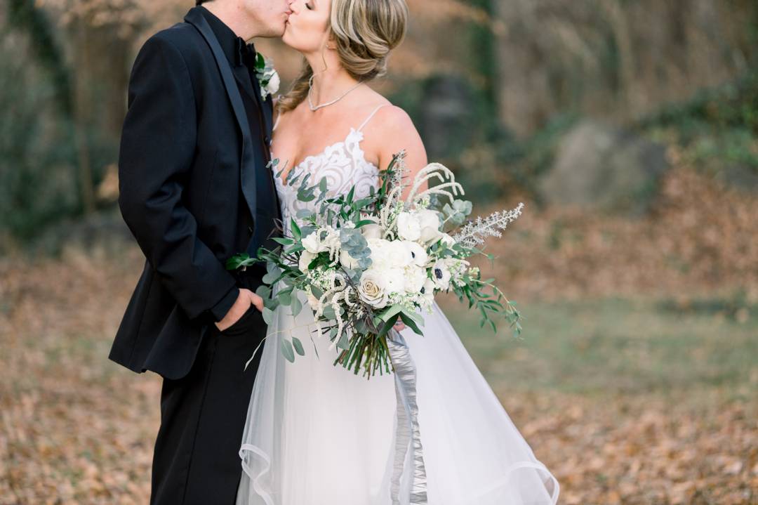 Bride and Groom formals outdoors at American Spirt Works. NYE wedding at the Stave Room by Atlanta wedding photographer Leigh Wolfe Photography.