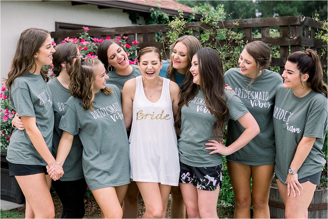 joyful bride with bridesmaids in matching_Photos by Leigh Wolfe, Atlanta's Top Wedding Photographer