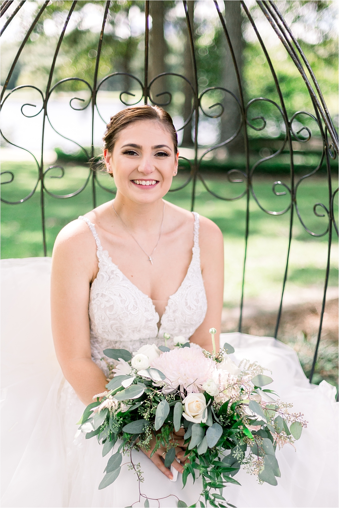 bride with bouquet on garden bench_Photos by Leigh Wolfe, Atlanta's Top Wedding Photographer
