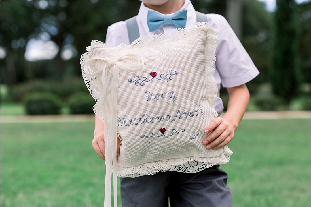 ring bearer with pillow_Photos by Leigh Wolfe, Atlanta's Top Wedding Photographer