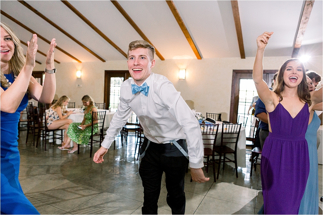 dancing groomsmen at reception_Photos by Leigh Wolfe, Atlanta's Top Wedding Photographer