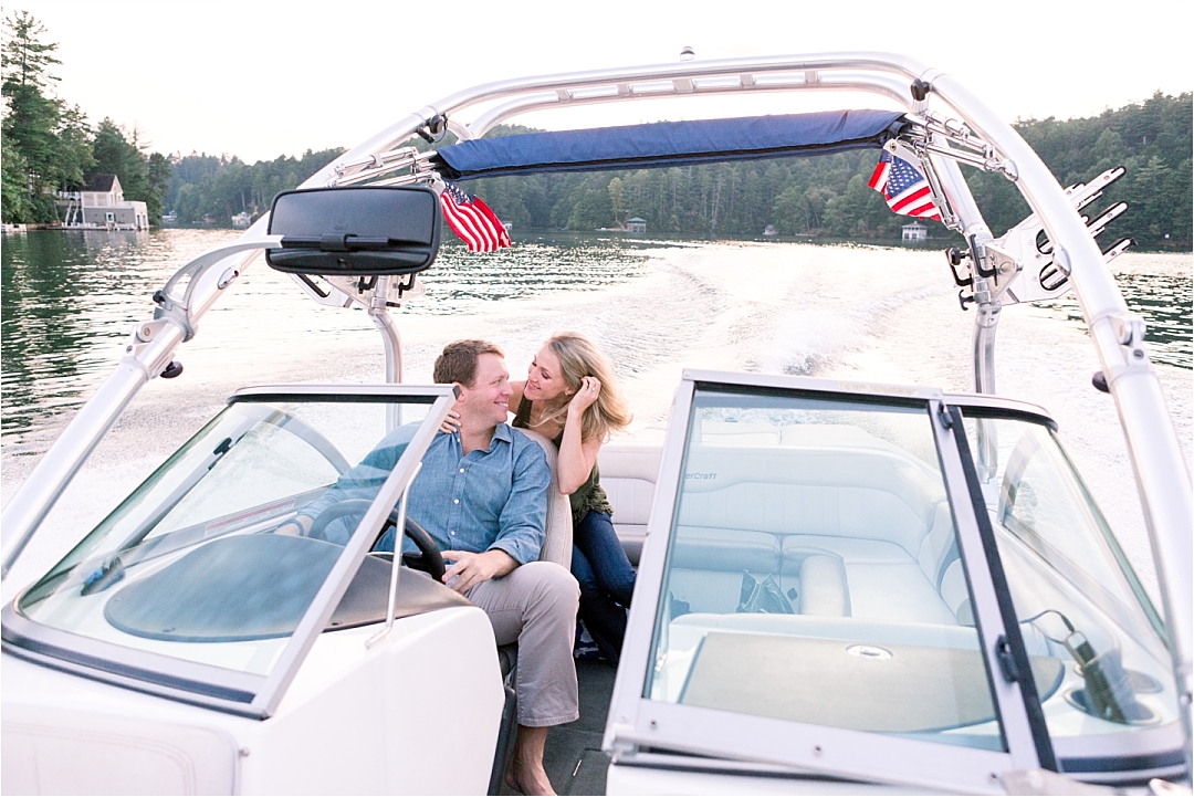 couple on boat with american flags_Photos by Leigh Wolfe, Atlanta's Top Wedding Photographer