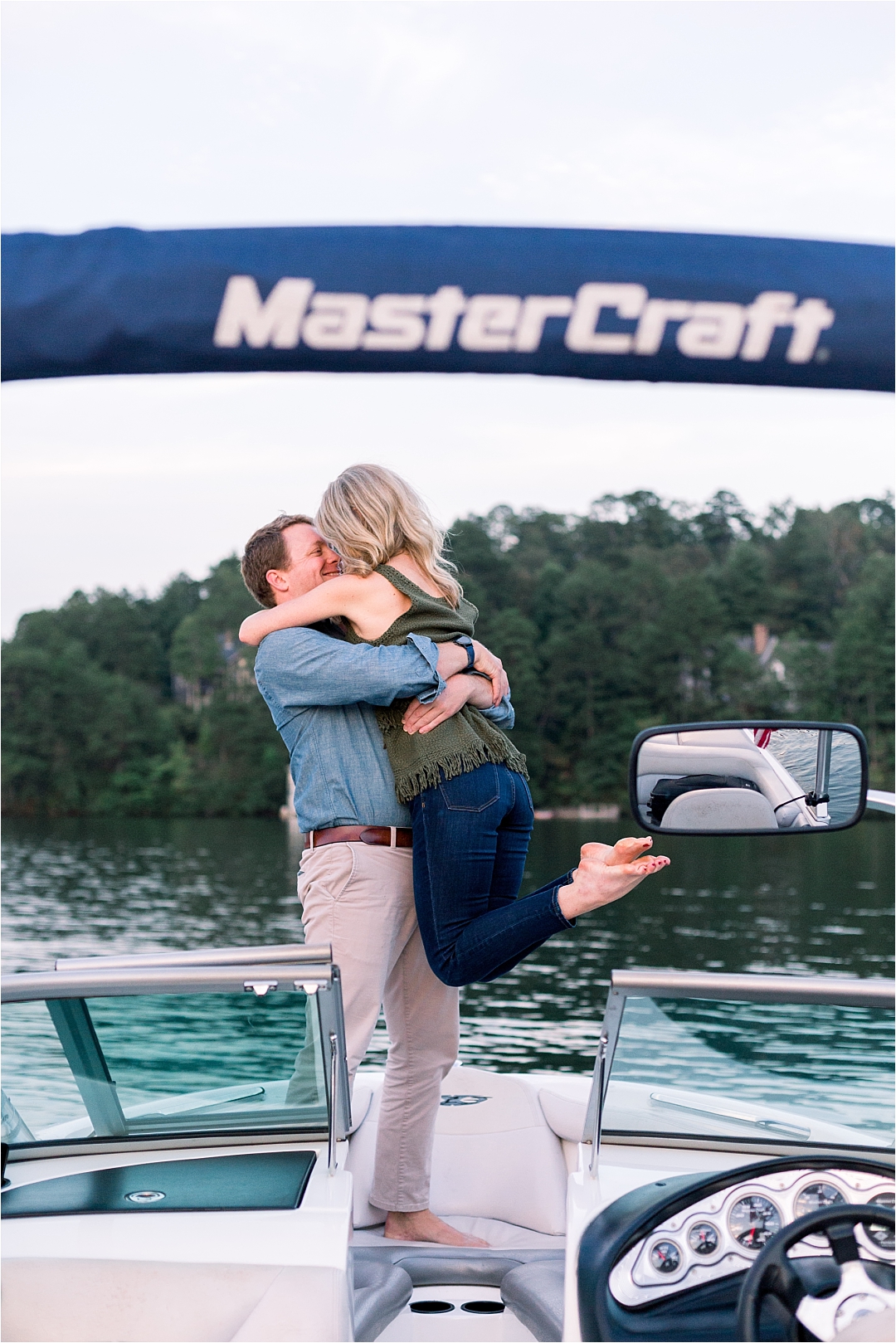 fiance picking up his love on lake_Photos by Leigh Wolfe, Atlanta's Top Wedding Photographer