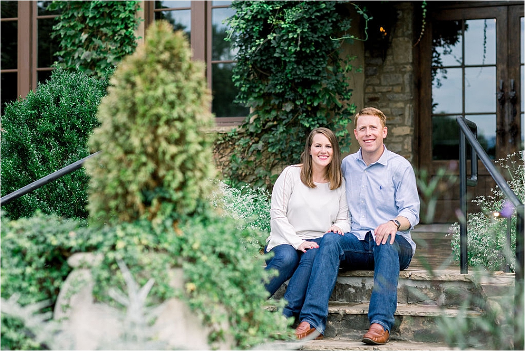 engaged couple sitting on stone steps_Photos by Leigh Wolfe, Atlanta's Top Wedding Photographer