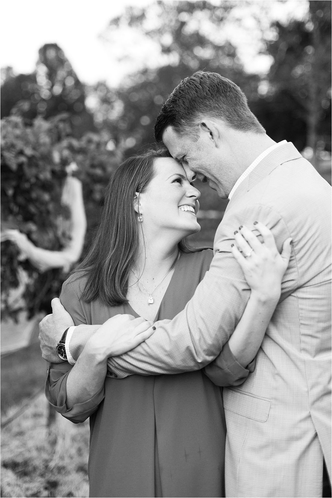 couple looking at each other lovingly during engagement_Photos by Leigh Wolfe, Atlanta's Top Wedding Photographer