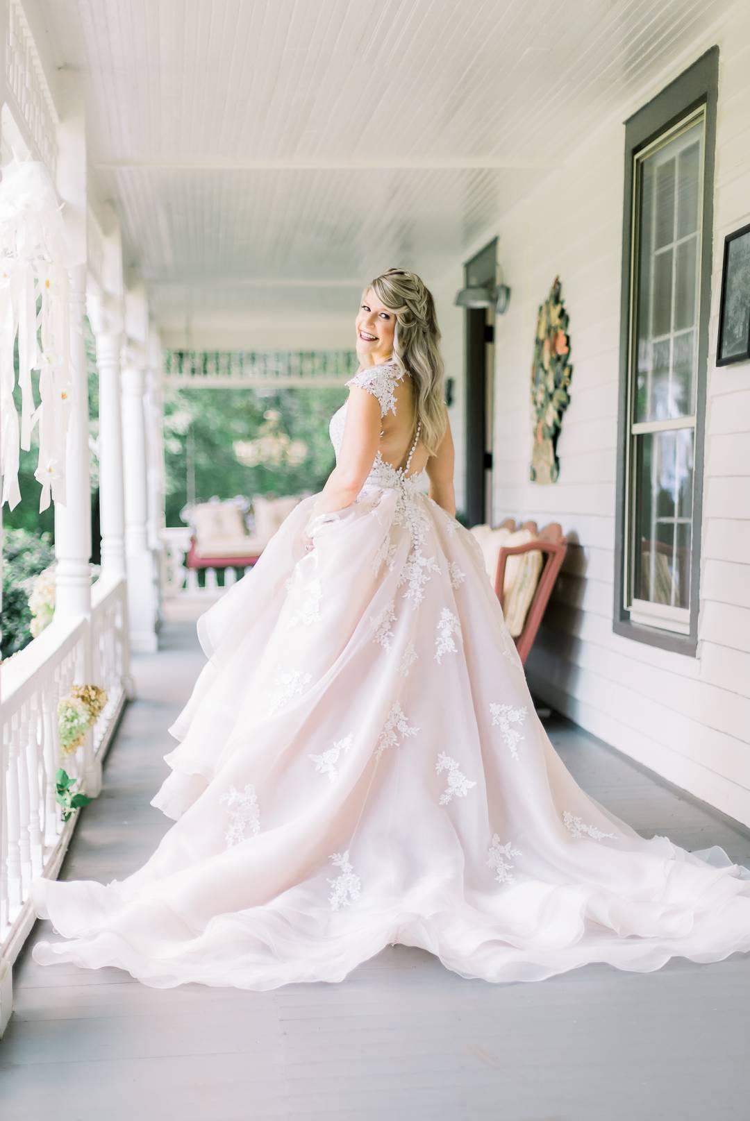 Bride in Essense of Australia wedding gown at her private residence wedding in Atlanta by Leigh Wolfe Photography.