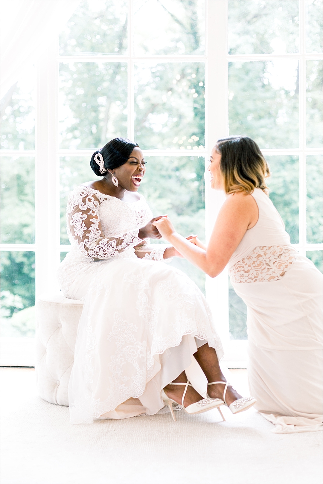 maid of honor helping bride with shoes_Photos by Leigh Wolfe, Atlanta's Top Wedding Photographer
