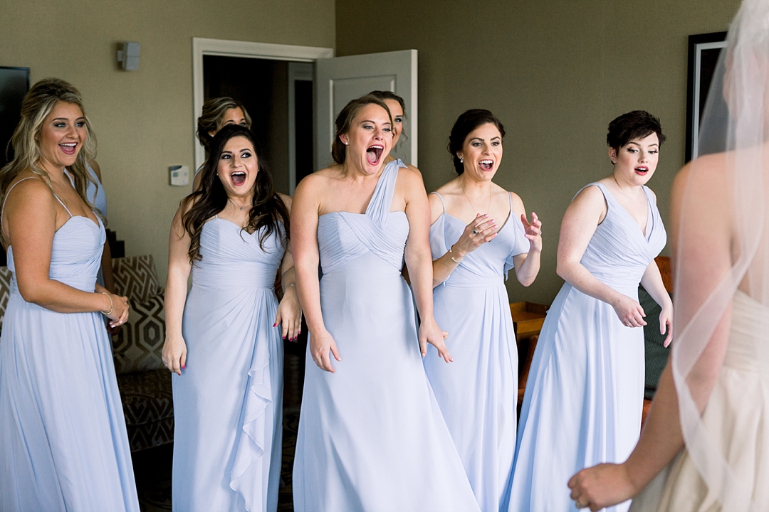 Bridesmaids seeing bride_Vendor details_Photos by Leigh Wolfe, Atlanta's top wedding photographer